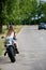 Young woman with a motorcycle speed