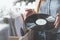 Young woman with music records indoors