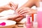 The young woman in nail treatment medical concept