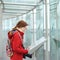 Young woman on observation deck in Montparnasse building in Paris