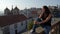 Young woman over the rooftops of Porto in Portugal