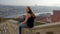 Young woman over the rooftops of Porto in Portugal