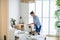 Young woman packing suitcase in the bedroom