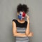 Young woman with Panama flag painted on her face