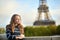 Young woman in Paris on a fall day