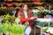 Young woman at Parisian flowers market