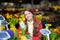 Young woman at Parisian flowers shop