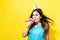 Young woman with party hat with noisemaker
