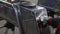 Young woman Passing through a Turnstile with Electronic Access Card in Metro underground Close up