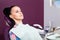 Young woman patient waiting for dentist ready for check-up