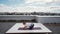 Young woman performs comlex asanas of hatha yoga is lying on yoga mat