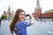 Young woman photographed attractions in Moscow