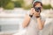 Young woman photographer portrait. Soft colors.