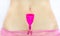 Young woman - pink menstrual cup