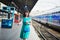 Young woman on the platform of a train station