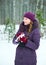 Young woman playing in snowball fights