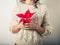 Young woman with poinsettia