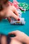 Young woman with poker cards