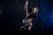 Young woman pole dancer. Water studio photo