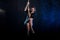 Young woman pole dancer. Water studio photo