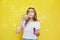 Young woman portrait blowing soap bubbles