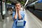 Young woman portrait inside metro subway