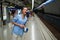 Young woman portrait inside metro subway