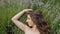 Young woman pose to photographer in lavender