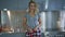 Young woman posing in kitchen