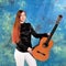 Young woman posing in the studio holding a classical guitar