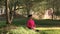 Young woman practicing meditation in the park