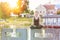 Young woman practicing vajra yoga in city near lake