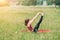 Young woman practicing yoga, Does morning exercises,