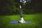 Young woman practicing yoga in the park,Yoga-Salamba Sarvangasana Supported Shoulderstand
