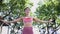 Young woman practicing yoga with stretched arms