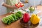 A young woman prepares bell peppers for her breakfast and is ready for a healthy meal on the table with healthy, organic