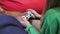 Young woman pressing buttons on gamepad, lady playing video games, gamer girl