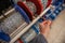 Young woman purchasing a hand tool in hardware shop