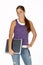 Young Woman in Purple Tank Top with Laptop Under Arm