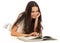 Young woman reading book on floor isolated