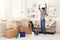 Young woman ready to clean her new apartment after moving