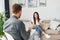 Young woman at a reception at a psychologist. Sits on the sofa