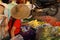 Young woman in red selling vegetables