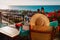 Young woman relax on scenic balcony terrace with cup of coffee