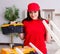 Young woman repairing chair at home