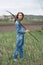 Young woman resetting raspberry sprouts