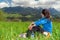 Young woman resting after hiking