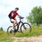 Young Woman riding bicycle