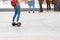 Young woman riding a hoverboard on the city square. New movement and transport technologies. Close up of dual wheel self