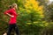 Young woman running outdoors on a lovely sunny day